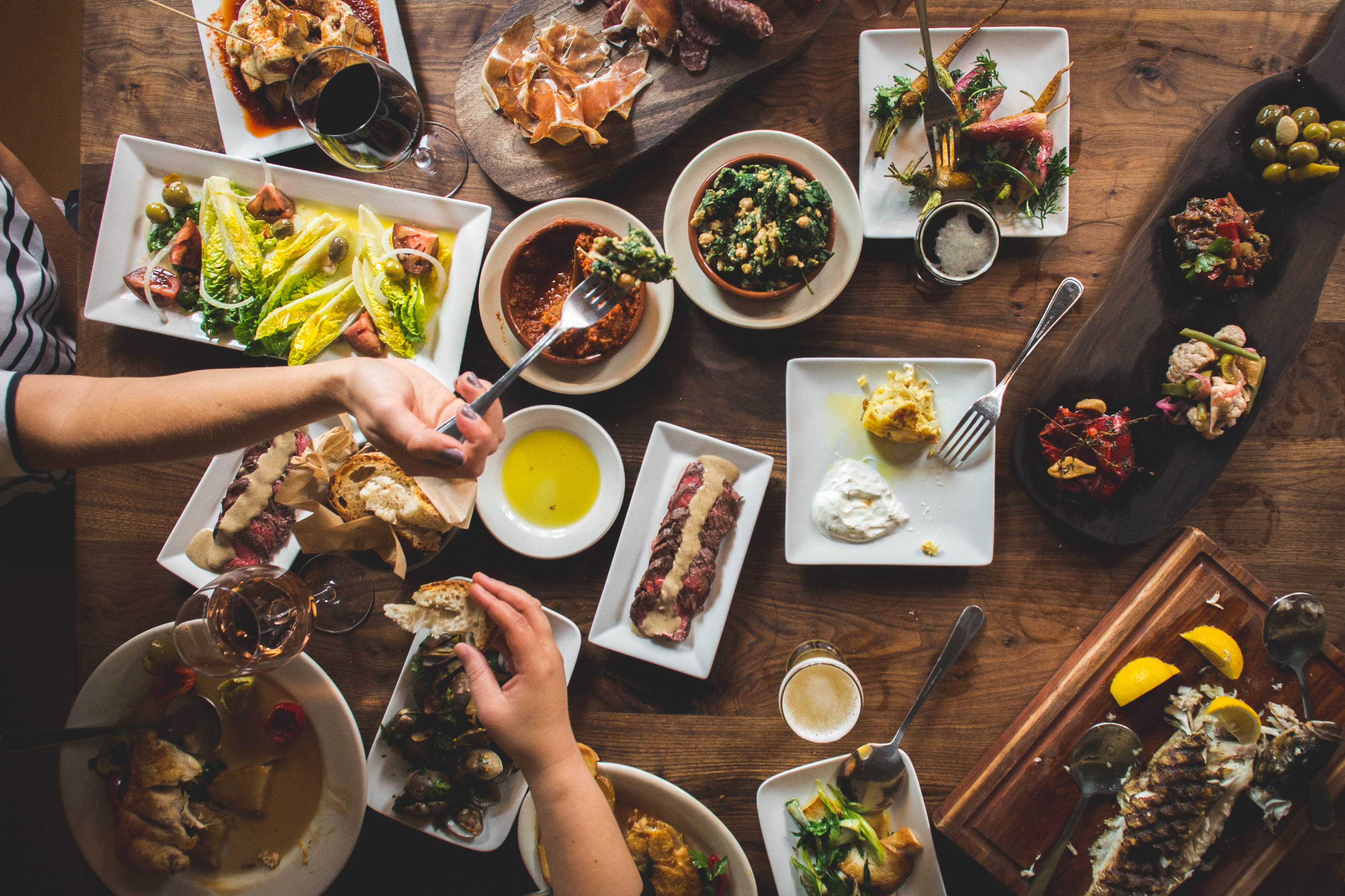 A table of Spanish tapas and wine at Barcelona Wine Bar